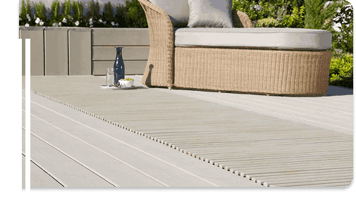 WPC decking with a cozy outdoor seating area and a table set