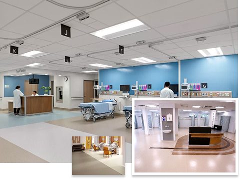 Clean hospital interior with blue walls, patient beds, and reception desks