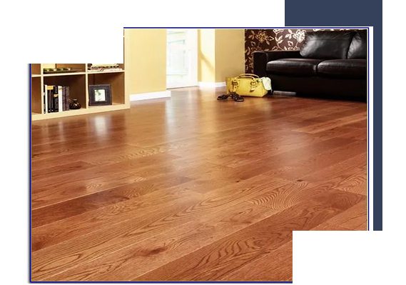 Warm-toned engineered wood flooring in a cozy living room