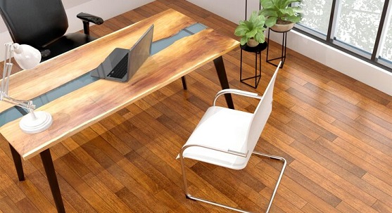Warm-toned engineered wood flooring in a modern office setup