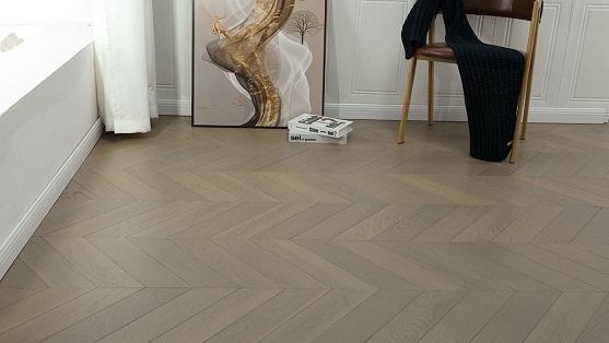 Soft grey chevron flooring in a modern minimalist interior